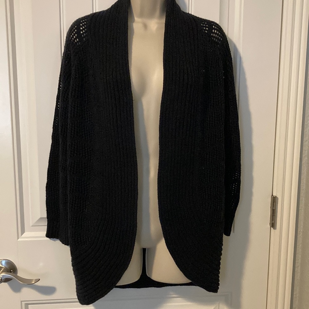 Candie’s black open knit cardigan